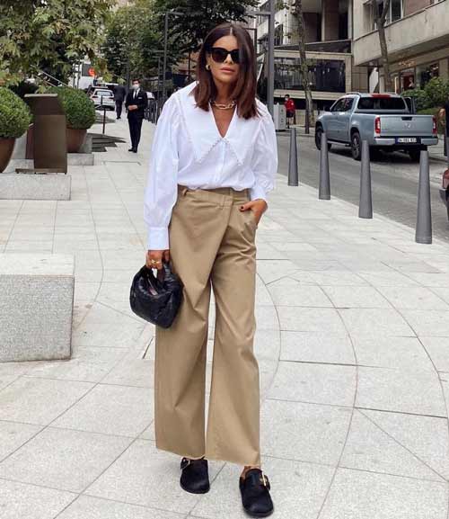 Avec un chemisier blanc