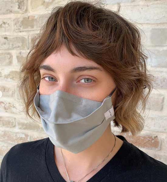 Coupe de cheveux shaggy avec une frange