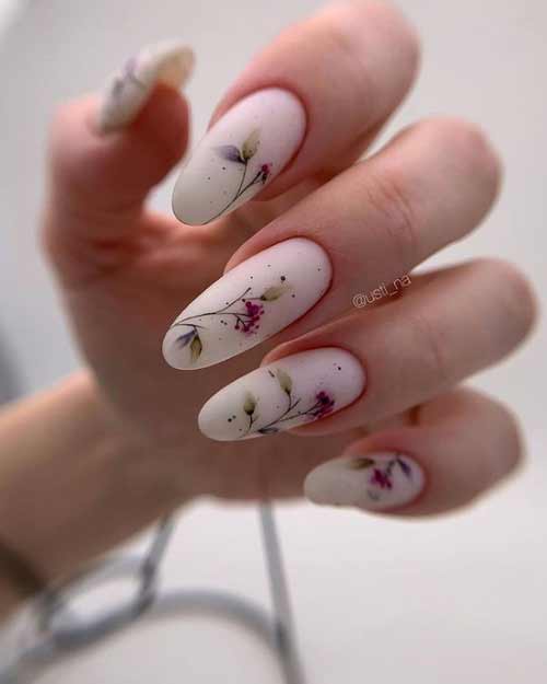 Ongles longs manucure pastel avec un motif