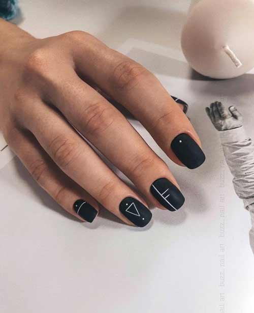 Géométrie noir et blanc sur les ongles