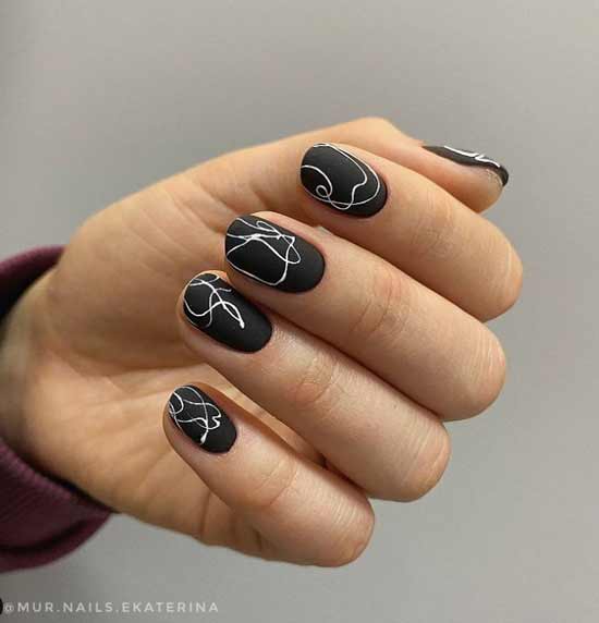 Manucure courte noir et blanc