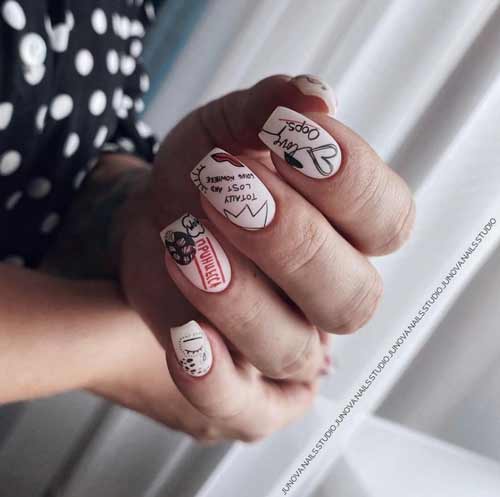 Conception d'ongles mats avec un cœur
