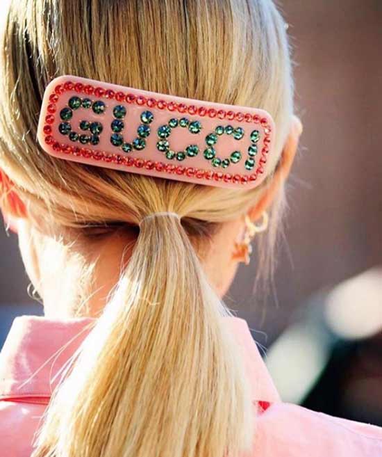 Barrette à logo Gucci