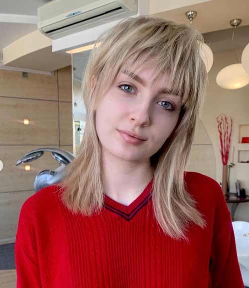 Maillet coupe de cheveux de longueur moyenne