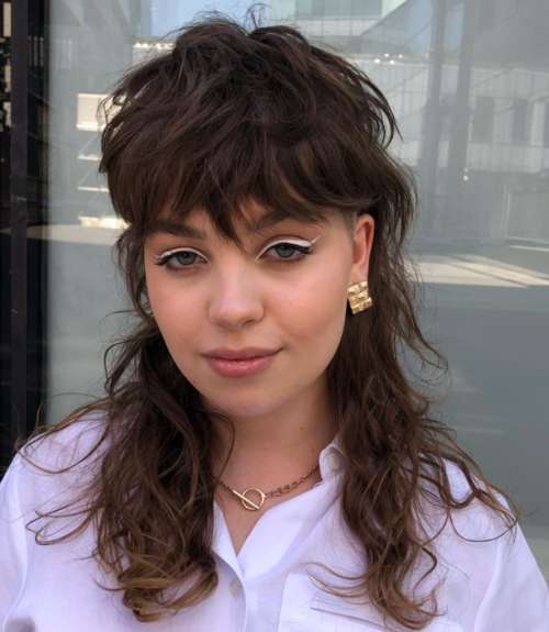 Coupe de cheveux long mulet cheveux bouclés