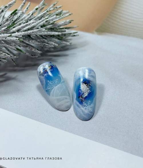 Manucure bleue du Nouvel An: nouveautés 2022, photos, idées de design
