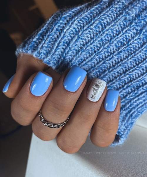 Manucure bleue du Nouvel An: nouveautés 2022, photos, idées de design