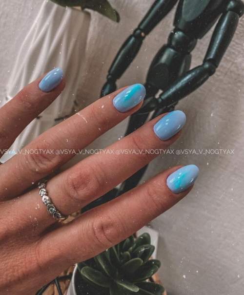 Manucure bleue du Nouvel An: nouveautés 2022, photos, idées de design