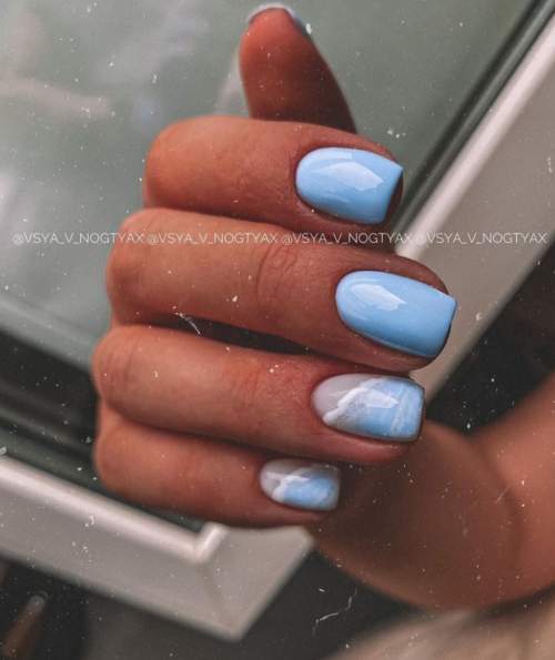 Manucure bleue du Nouvel An: nouveautés 2022, photos, idées de design