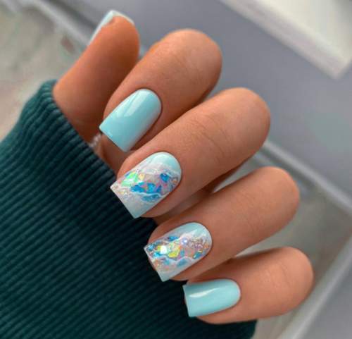 Manucure bleue du Nouvel An: nouveautés 2022, photos, idées de design