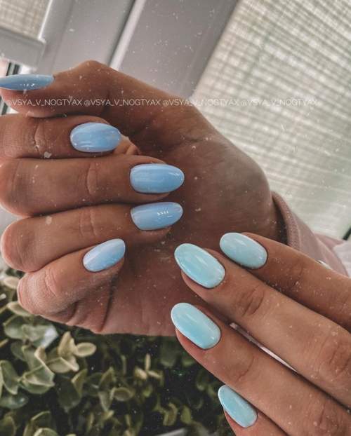 Manucure bleue du Nouvel An: nouveautés 2022, photos, idées de design