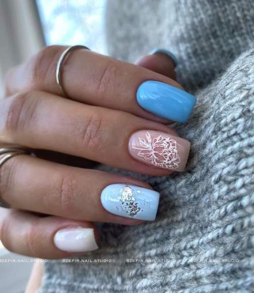 Manucure bleue du Nouvel An: nouveautés 2022, photos, idées de design