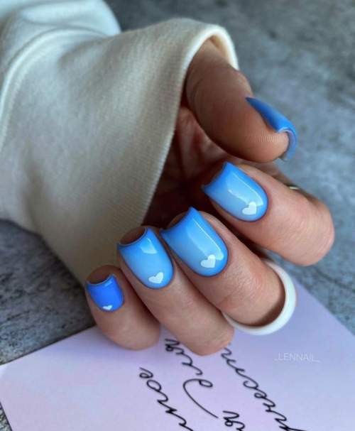 Manucure bleue du Nouvel An: nouveautés 2022, photos, idées de design