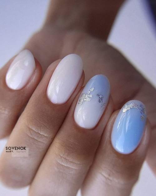 Manucure bleue du Nouvel An: nouveautés 2022, photos, idées de design
