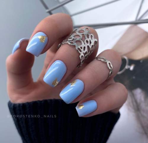 Manucure bleue du Nouvel An: nouveautés 2022, photos, idées de design