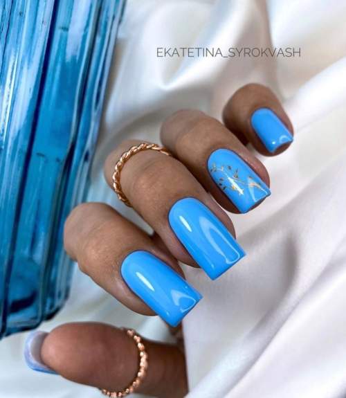 Manucure bleue du Nouvel An: nouveautés 2022, photos, idées de design