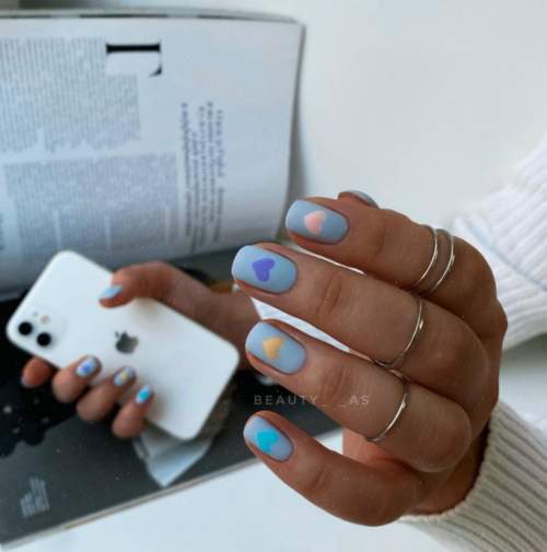 Manucure bleue du Nouvel An: nouveautés 2022, photos, idées de design