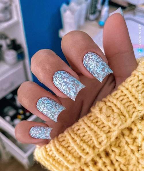 Manucure bleue du Nouvel An: nouveautés 2022, photos, idées de design