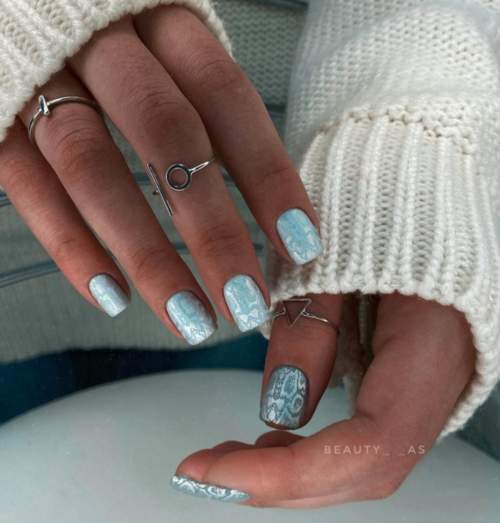 Manucure bleue du Nouvel An: nouveautés 2022, photos, idées de design