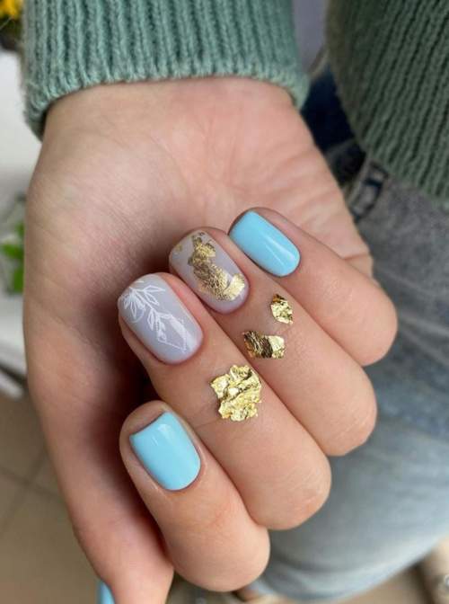 Manucure bleue du Nouvel An: nouveautés 2022, photos, idées de design