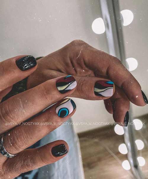 Manucure aux couleurs foncées pour les ongles très courts