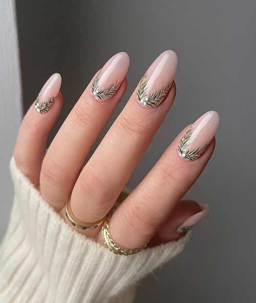 Manucure avec des branches de sapin de Noël