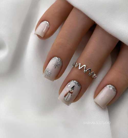 Bonhommes de neige de Noël sur les ongles