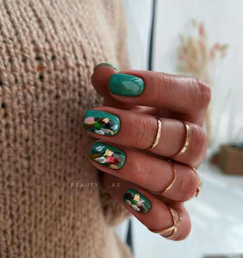 Manucure verte avec des traits colorés