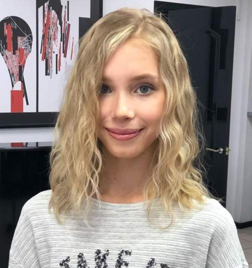 Coupe de cheveux ado frisée