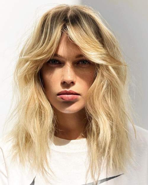 Coupe de cheveux et rideau de frange