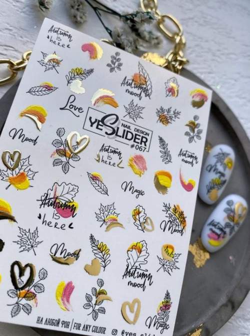 Dessins d'automne sur les ongles amandes