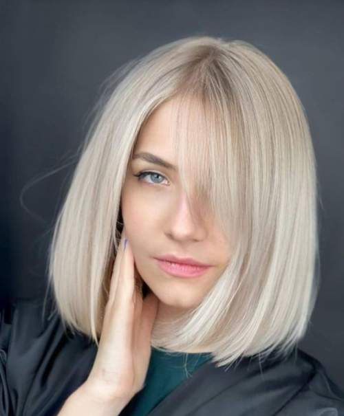 Bangs réels 2023: photos, types à la mode, tendances