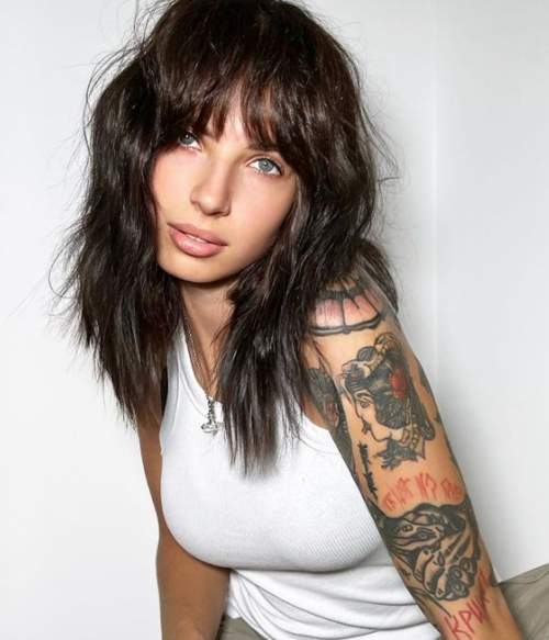 Bangs réels 2023: photos, types à la mode, tendances