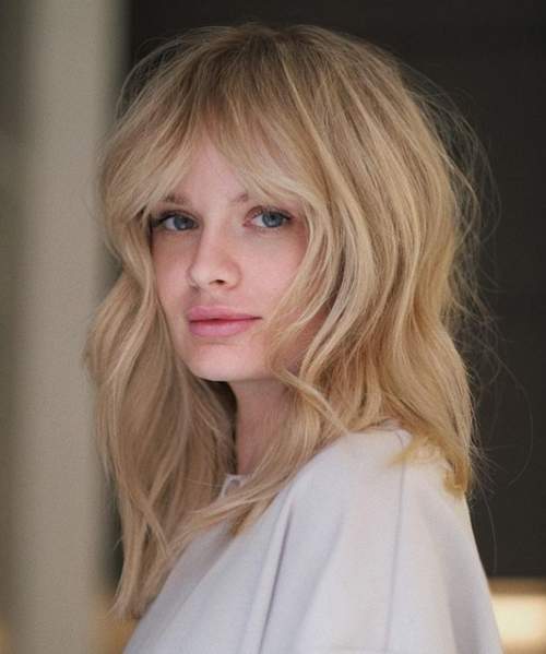 Bangs réels 2023: photos, types à la mode, tendances