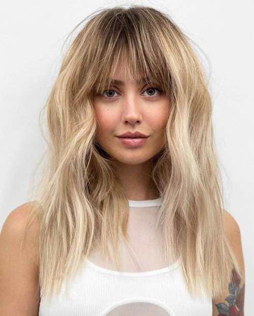 Bangs réels 2023: photos, types à la mode, tendances