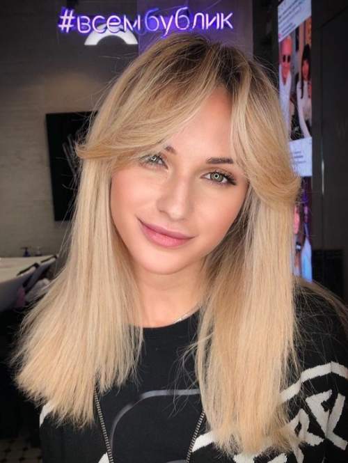 Rideau de frange aux cheveux longs: coupes de cheveux 2023, photo