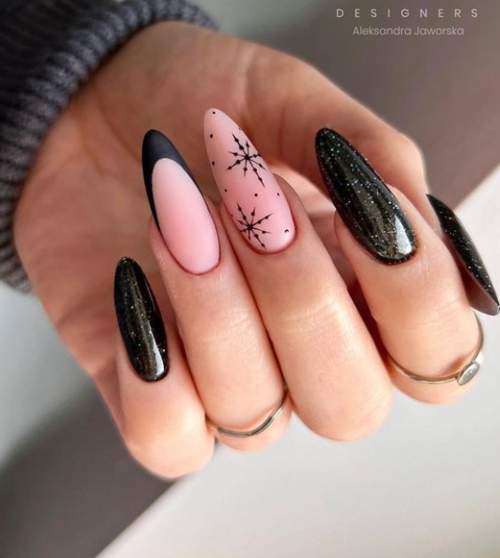 Veste noire avec flocon de neige