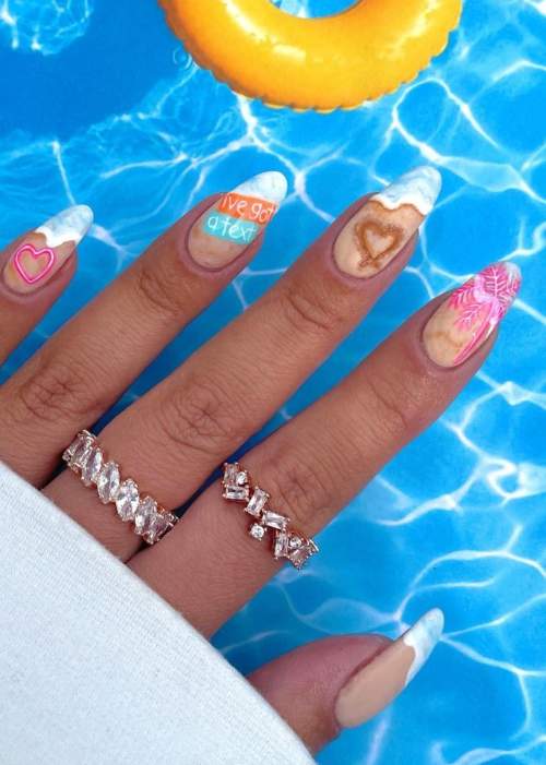 100 idées manucure pour le 14 février : une photo avec un nouveau design