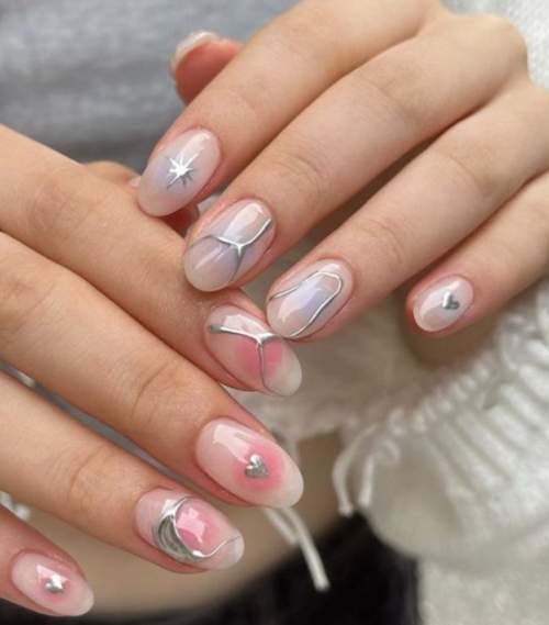 100 idées manucure pour le 14 février : une photo avec un nouveau design