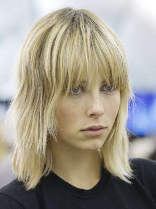 Coupe de cheveux moyenne louveteau