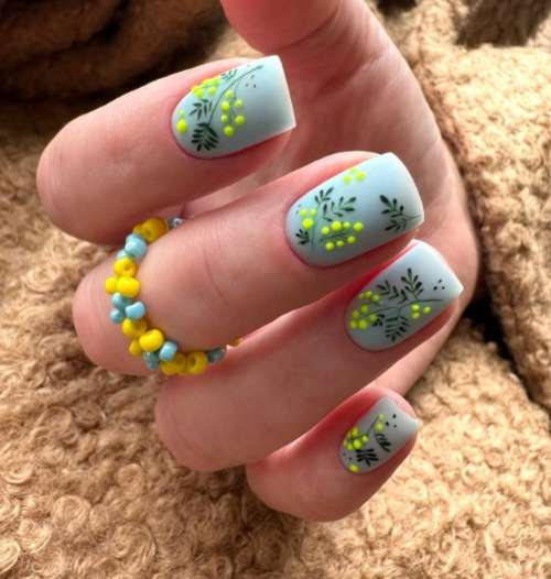 Dessins de mimosa sur les ongles