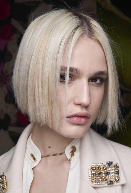 La photo de montre une coupe de cheveux comme un bob